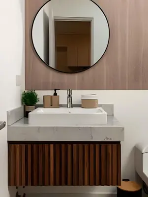 a bathroom with a white sink and a mirror at Artline Terrace Residence in Lima