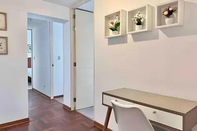 a dining room with a table and chairs at Big 3BR Apartment in the center of Miraflores in Lima
