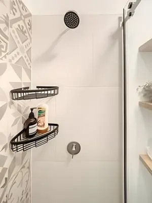 a shower with black shelves in a bathroom at Contemporary Great View in Lima