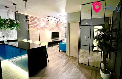 a room with a kitchen and a living room at iStay 1bed 1Bathroom Urban Deluxe in Lima