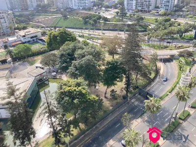 an aerial view of a park with trees and a street at iStay Encantador Loft Piscina BBQ Gym Bicicleta in Lima