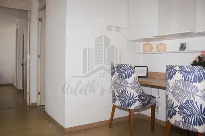 a dining room with a table and two chairs at Cozy apartment in San Miguel in Lima