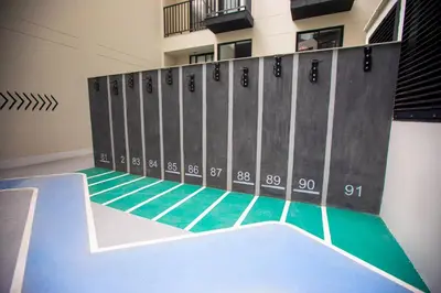 an empty locker room with a basketball court at BSR Modern Spacious New Flat in Miraflores w/ Pool in Lima