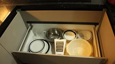 a box with dishes and utensils in it at Moderno Depa Céntrico en Abancay in Abancay