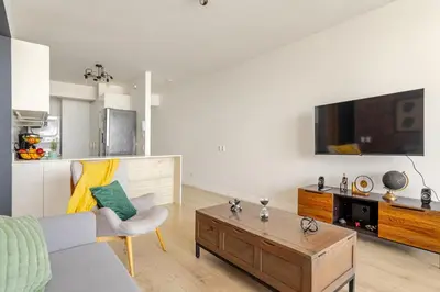 a living room with a couch and a coffee table at Miraflores - departamento con 3 dormitorios in Lima