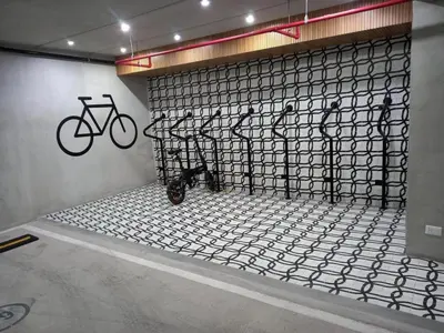 a room with a wall with bikes on it at San Isidro Financial Flat Lima in Lima