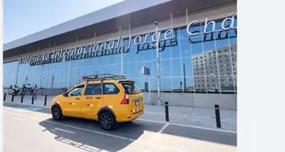 a small yellow car parked in front of a building at HK5 Bed And Breakfast Apartment in Lima