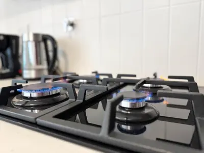 a close up of a stove top oven at Estancia de lujo en Miraflores Entre Marriott y Pullman in Lima