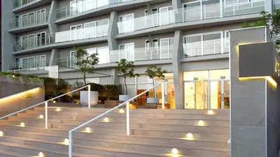 a building with stairs in front of a building at Tempo Moderno Departamento in San Antonio