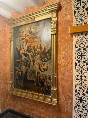 a painting of theoration of the magi on a wall at Ayni Boutique Hotel in Cusco