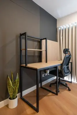 an office cubicle with a desk and a chair at Solar Breezy Retreat by Geko in Lima
