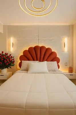 a bedroom with a large bed with a large headboard at LimaeStays Exclusive penthouse in downtown Barranco in Lima