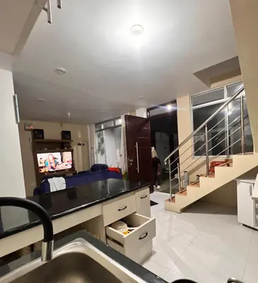 a room with a sink and a room with stairs at Casa Rosé Vacacional in Santa Rosa