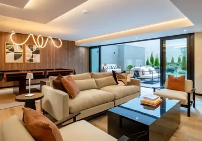 a living room with a couch and a table at Modern Brand New Apartment in Miraflores in Lima