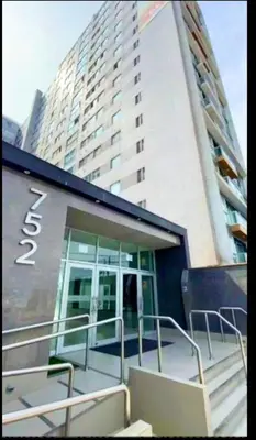 a building with a staircase in front of a building at Bertolotto, divino minidepa smartv wifi y amoblado in Lima