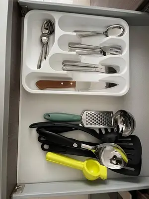 a drawer filled with lots of kitchen utensils at Entire apartment minutes from Miraflores in Lima