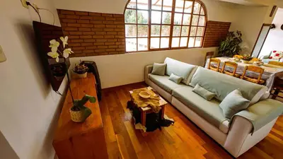 a living room with a couch and a table at Fundo Venegas & Montoya in Jauja