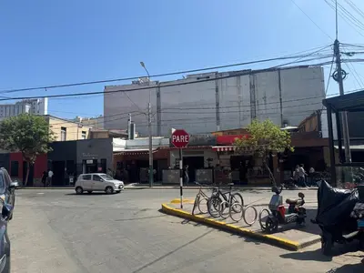 a street with a stop sign and bikes on a curb at Centrally located and comfortable duplex in Miraflores - Libertad1BR in Lima