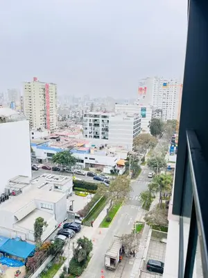 a view of a city from a building at La Foret in Lima