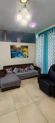 a living room with two couches and a couch at Casa San Ramón in San Ramón