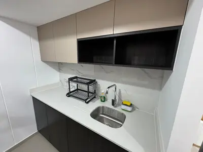 a kitchen with a sink and a counter top at Cozy bedroom in Miraflores with rooftop pool in Lima