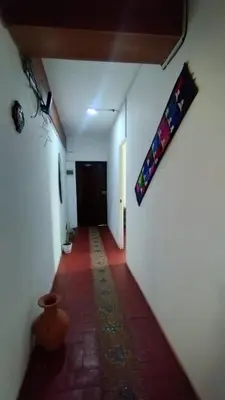 an empty hallway with a hallwayngthngthngthngthngthngthngthngthngthngth at Maruri Valentino apartment in Cusco