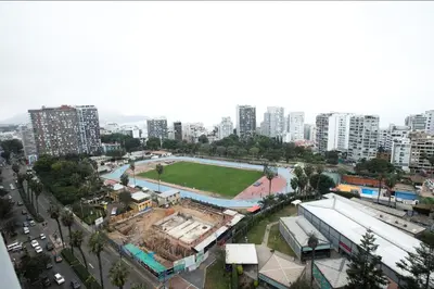 an aerial view of a city with a park at iStay Acogedor Loft Piscina BBQ Gym Bicicleta in Lima