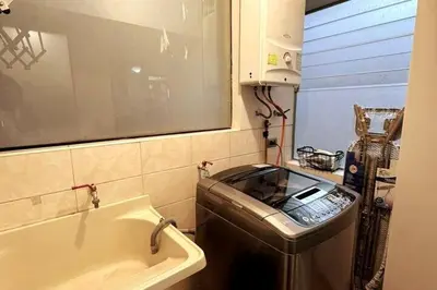 a bathroom with a sink and a bath tub at Departamento en Cusco NAIRA in Cusco