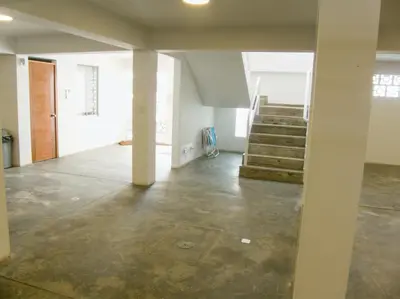 an empty room with stairs in a building at Apartment with Beach Exit 204 in Punta Negra