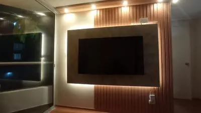 a flat screen tv on a wall in a room at Dpto entero 2 dormitorios 2 baños máximo 5 personas in Lima