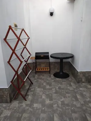 a table in a room with a table against a wall at Suspiros de arica in Arica