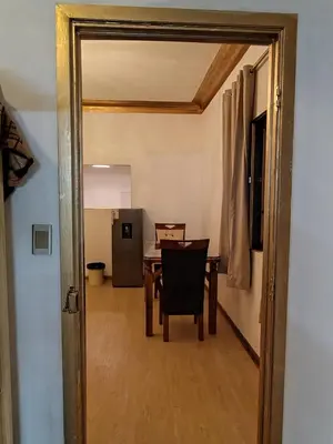 an open door to a dining room with a table at Centro Historico Lima - Apartamento in Lima
