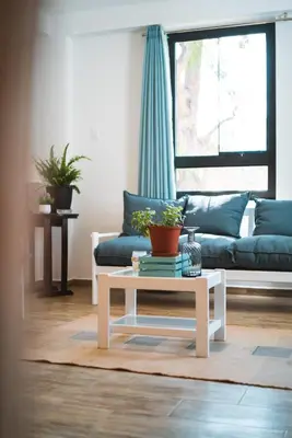 a living room with a couch and a coffee table at Casa Julia in Huayllabamba