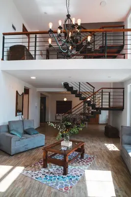 a living room with a couch and a table at Casa Julia in Huayllabamba