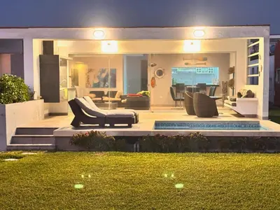 a house with a couch and a living room at Casa de playa 1era fila cala del mar in Salitre
