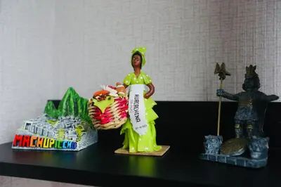 a toy figurine on a shelf with other toys at Perfect Balance Rest and Work Study Oceanfront in San Antonio