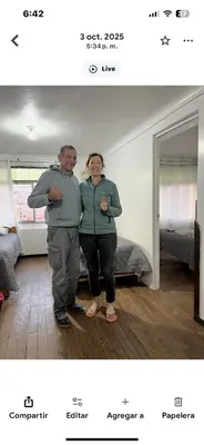 a man and a woman standing in a room at Apartamento Salkantay con vista al Cusco in Cusco