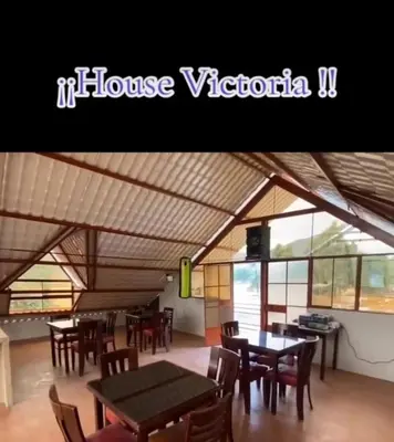 a dining room with tables and chairs in a building at VICTORIA HOUSE - Huancayo - Hualhuas in Hualhuas