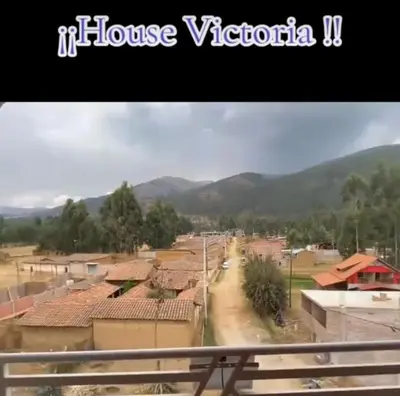 a view of a town with mountains in the background at VICTORIA HOUSE - Huancayo - Hualhuas in Hualhuas
