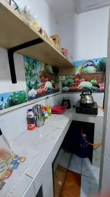 a toy kitchen with a counter top with a stove at Altos Del Valle in Cusco