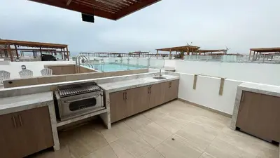 a kitchen with a sink and a tub on a roof at Casa Playa Azul Verano 2026 Asia in Cerro Azul