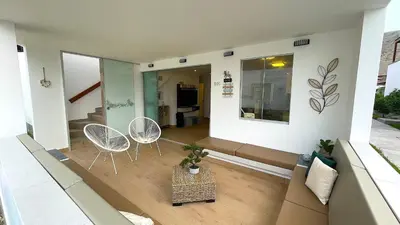a living room with two chairs and a couch at Casa Playa Azul Verano 2026 Asia in Cerro Azul