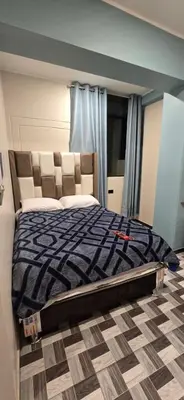 a bedroom with a large bed in a room at Hotel gym club33 in Huancayo