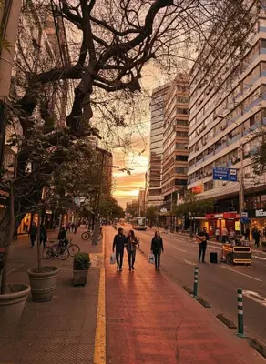 a group of people walking down a city street at Business Class Suite Miraflores! in Lima