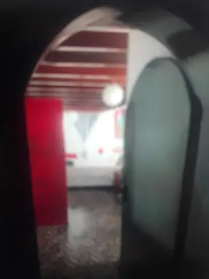 a view of a room with a red and white wall at Miraflores Effyciency 5to piso in Lima