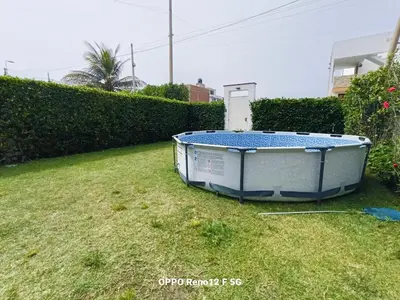 a hot tub sitting on the grass in a yard at Casasol in Santa Rosa