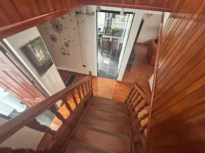 an overhead view of a staircase in a house at Legendary Rock Cusco Apartment in Cusco
