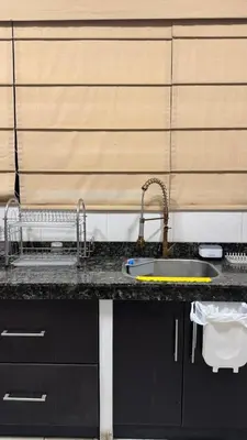 a kitchen counter top with a sink and a sink at Casa de Campo Las Siete Gotas - Cieneguilla in Cieneguilla