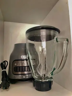 a blender sitting on a counter next to a toaster at Private cinema & comfort in cultural Barranco in Lima