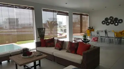 a living room with a couch and a table at Asia las terrazas casa in Asia